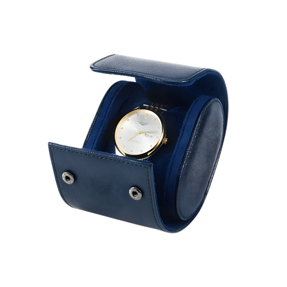 Blue watch case with a gold and white watch on a white background