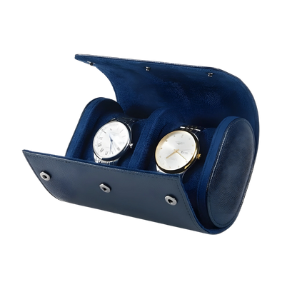 Blue watch winder with two watches inside on a white background